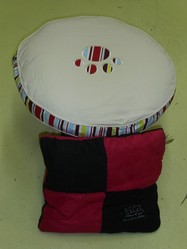Sofa rond beige et coussin 3 en 1 d'Alter Ego