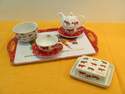 Gamme COW PARADE - CUISINE ET ARTS DE LA TABLE - LE TORCHON A CARREAUX