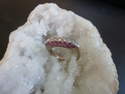 Ligne de Diamants et Saphir rose sur or blanc
