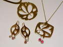 Pendentifs et Boucles d'oreille or blanc -bijoux de createur