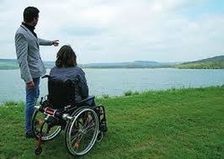 Motorisation de fauteuil roulant manuel